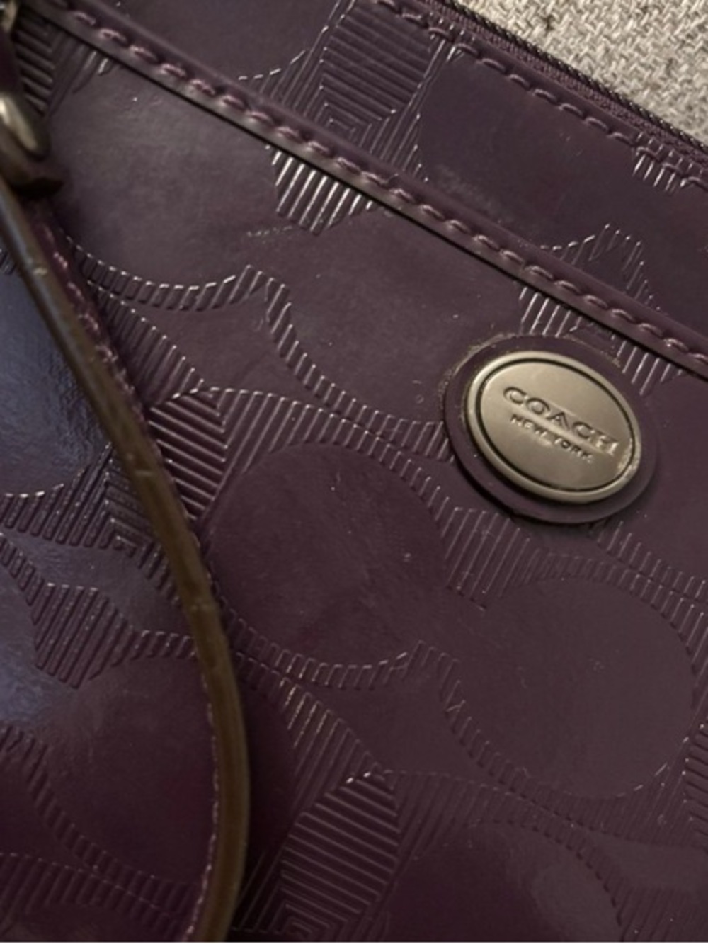 Coach Women’s Plum Signature Leather Wrist Bag